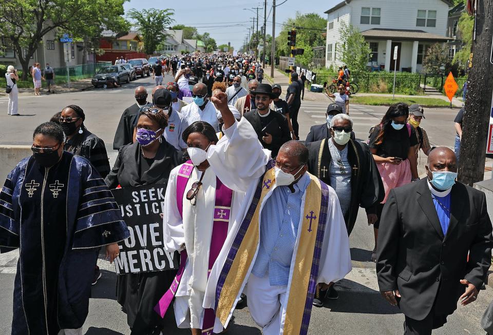 <span class="caption">Clergy of color lead a march in Minneapolis to protest the killing of George Floyd.</span> <span class="attribution"><a class="link " href="https://www.gettyimages.com/detail/news-photo/minneapolis-mn-june-2-clergy-of-color-led-a-silent-clergy-news-photo/1242702156?adppopup=true" rel="nofollow noopener" target="_blank" data-ylk="slk:David Joles/Star Tribune via Getty Images;elm:context_link;itc:0;sec:content-canvas">David Joles/Star Tribune via Getty Images</a></span>