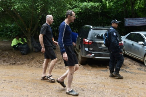 Two British divers, Richard Stanton (L) and John Volanthen (C), managed to reach the missing boys