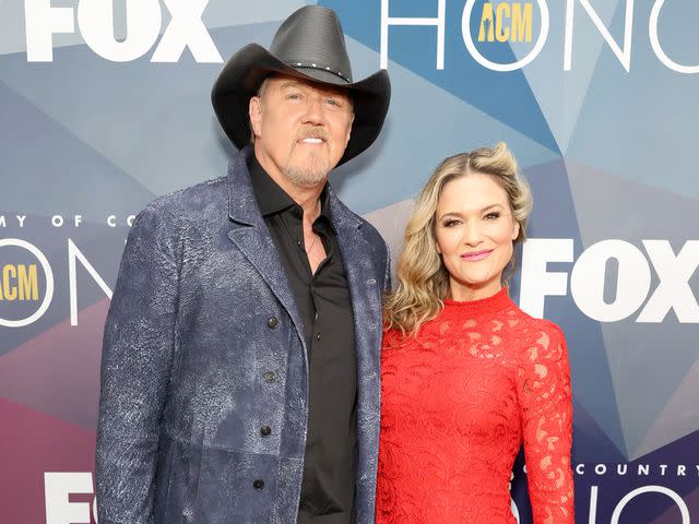 <p>Jason Kempin/Getty</p> Trace Adkins and Victoria Pratt at the 15th Annual Academy of Country Music Honors in 2022