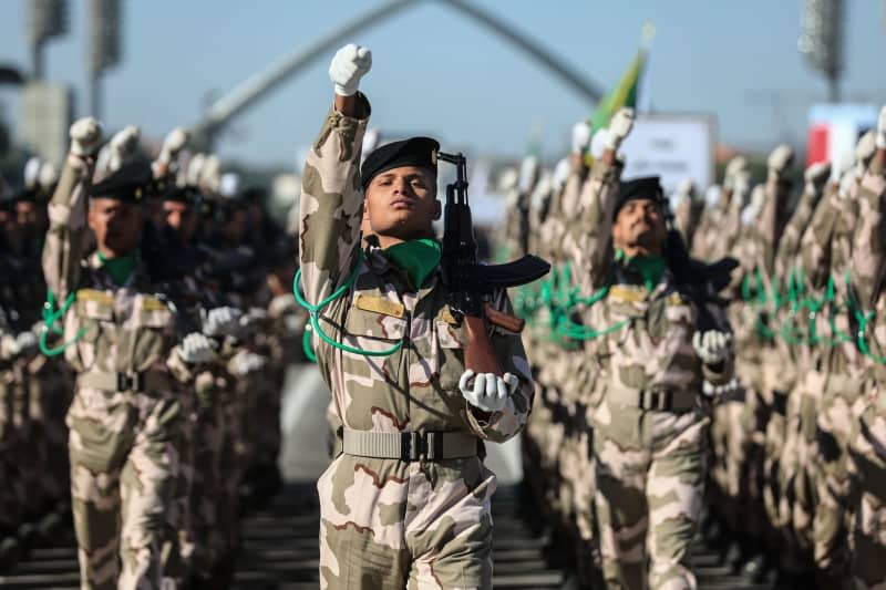 Soldiers take part in a military parade to celebrate the 103rd anniversary of the founding of the Iraqi army in the Grand Festivities Square inside the Green Zone in Baghdad. Ameer Al-Mohammedawi/dpa