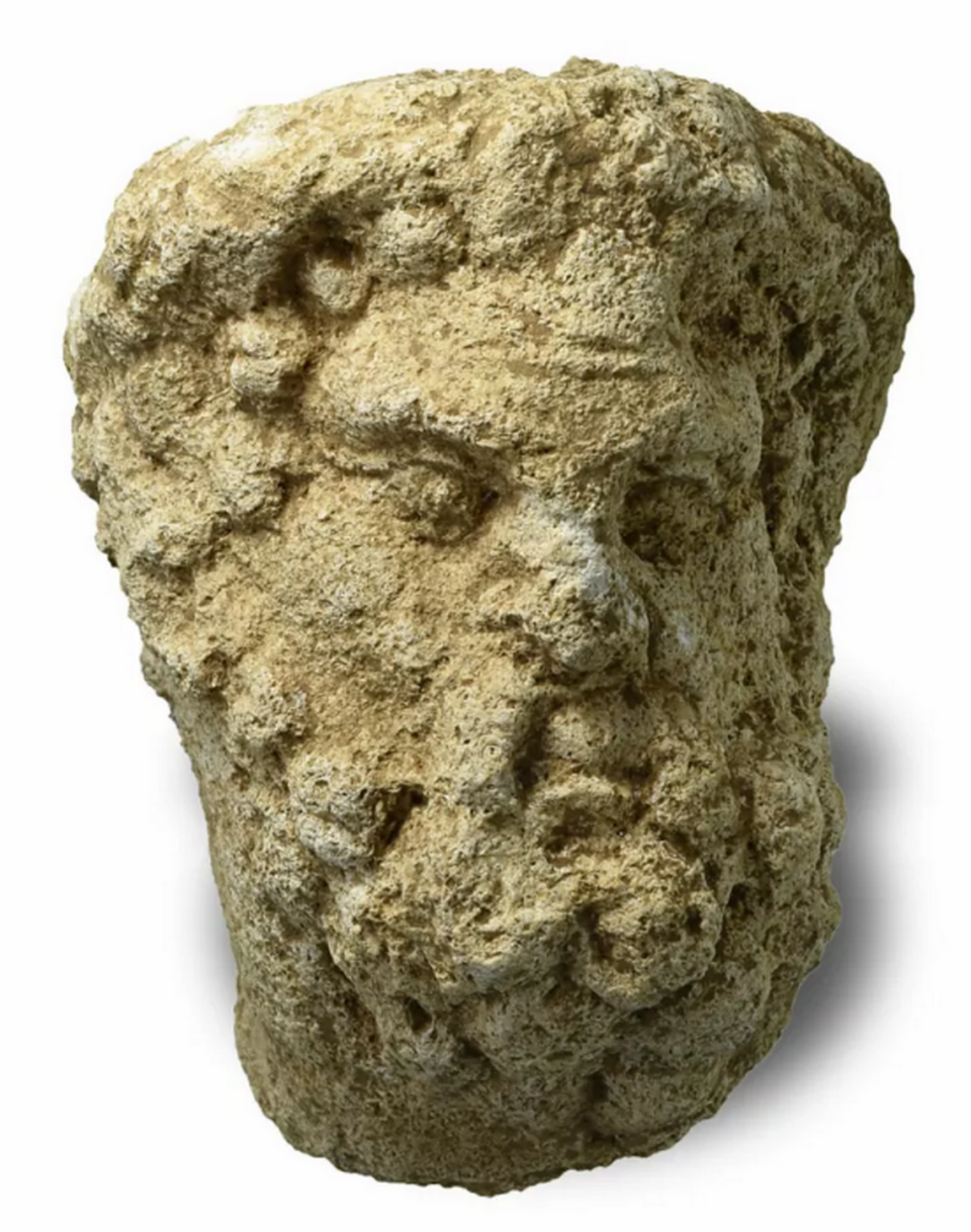 The head of a limestone statue found at the sanctuary complex.