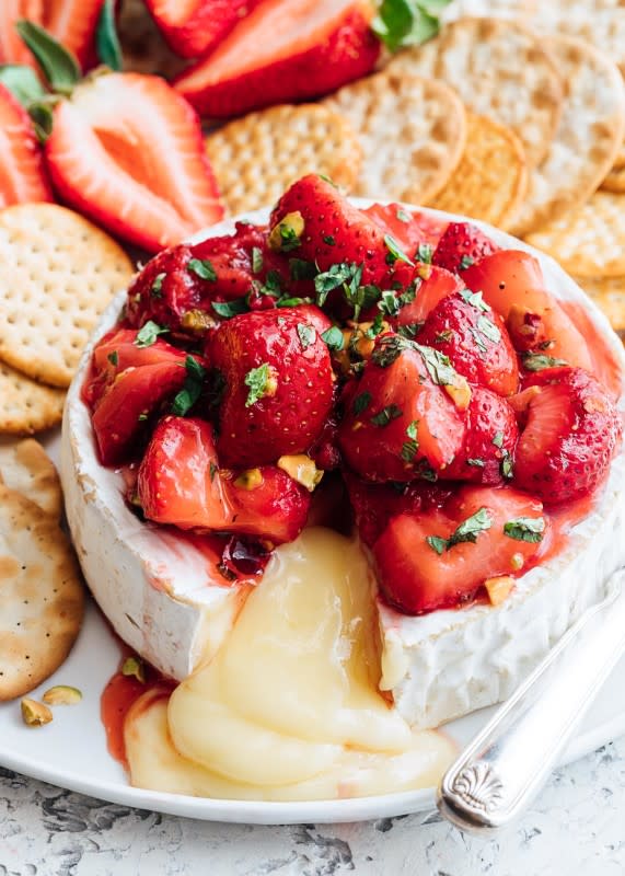 <p>Striped Spatula</p><p>Baked brie might be a classic appetizer, but the roasted strawberries make it new again.</p><p><strong>Get the recipe: <a href="https://stripedspatula.com/baked-brie-recipe-roasted-strawberries/" rel="nofollow noopener" target="_blank" data-ylk="slk:Baked Brie with Roasted Strawberries;elm:context_link;itc:0;sec:content-canvas" class="link ">Baked Brie with Roasted Strawberries</a></strong></p>