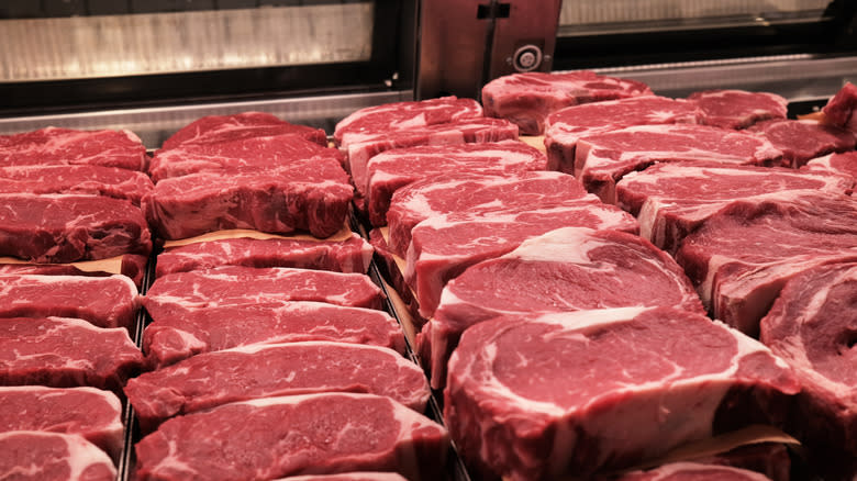 Steaks in butcher case at store 