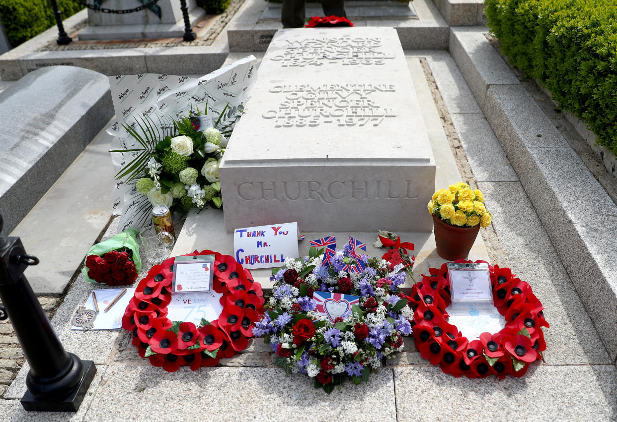BLADON, OXFORDSHIRE - MAY 08: A detailed view of poppy wreaths and other tributes on the grave of Sir Winston Churchill in the cemetery of St Martin's Church on May 08, 2020 in Bladon, Oxfordshire, United Kingdom. The UK commemorates the 75th Anniversary of Victory in Europe Day (VE Day) with a pared-back rota of events due to the coronavirus lockdown. On May 8th, 1945 the Allied Forces of World War II celebrated the formal acceptance of surrender of Nazi Germany. (Photo by Martin Willetts Getty Images)