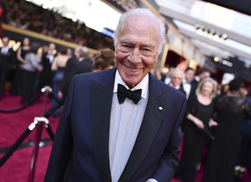 FILE - Christopher Plummer arrives at the Oscars on March 4, 2018, in Los Angeles. Plummer, the dashing award-winning actor who played Captain von Trapp in the film “The Sound of Music” and at 82 became the oldest Academy Award winner in history, has died. He was 91. Plummer, the dashing award-winning actor who played Captain von Trapp in the film “The Sound of Music” and at 82 became the oldest Academy Award winner in history, has died. He was 91. Plummer died Friday morning, Feb. 5, 2021, at his home in Connecticut with his wife, Elaine Taylor, by his side, said Lou Pitt, his longtime friend and manager. (Photo by Charles Sykes/Invision/AP, File)