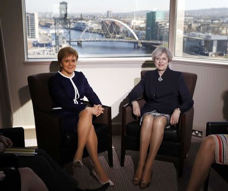 Britain's Prime Minister Theresa May and Scotland's First Minister Nicola Sturgeon meet in a hotel in Glasgow, Scotland, March 27, 2017. REUTERS/Russell Cheyne