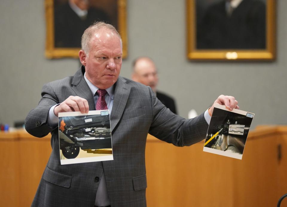 Daniel Perry's defense attorney Doug O'Connell shows photos to the jury Wednesday.