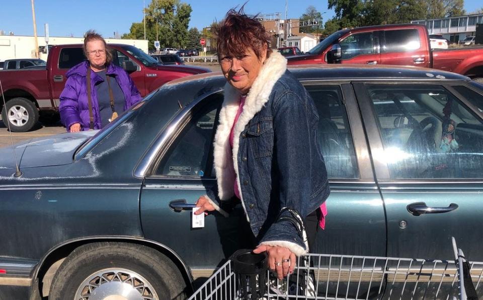 Grocery shoppers Deb Buringa, at left, and Kathy Ryther, shown at a food store in Pierre, S.D., in 2021, were concerned about the rising price of groceries at the time. While living on fixed incomes, they both make hard choices about what and what not to buy.