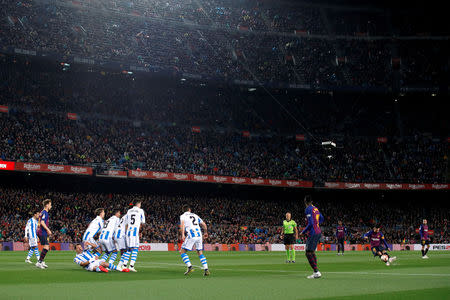 Soccer Football - La Liga Santander - FC Barcelona v Real Sociedad - Camp Nou, Barcelona, Spain - April 20, 2019 Barcelona's Lionel Messi shoots at goal from a free kick REUTERS/Albert Gea TPX IMAGES OF THE DAY