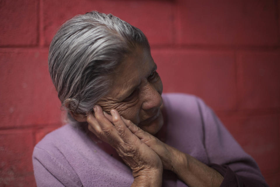 In this March 6, 2014 photo, Austina Machic, 76 years-old, pauses during an interview at her home in San Andres Itzapa, Guatemala. In November 1988 in the mountainous area of western Guatemala, 22 men who lived in the village of El Aguacate where massacred by leftists guerillas during the Guatemalan civil war. The case will be taken to court on Thursday, March 13, 2014, in which more than 30 persons are expected to testify. Machic's husband Horacio tajtaj Callejas was killed in the massacre. (AP Photo/Luis Soto)