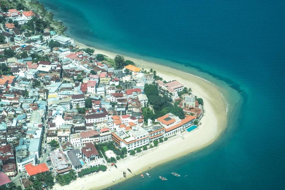 An aerial view of Stone Town and nearby beaches in Zanzibar, Tanzania.