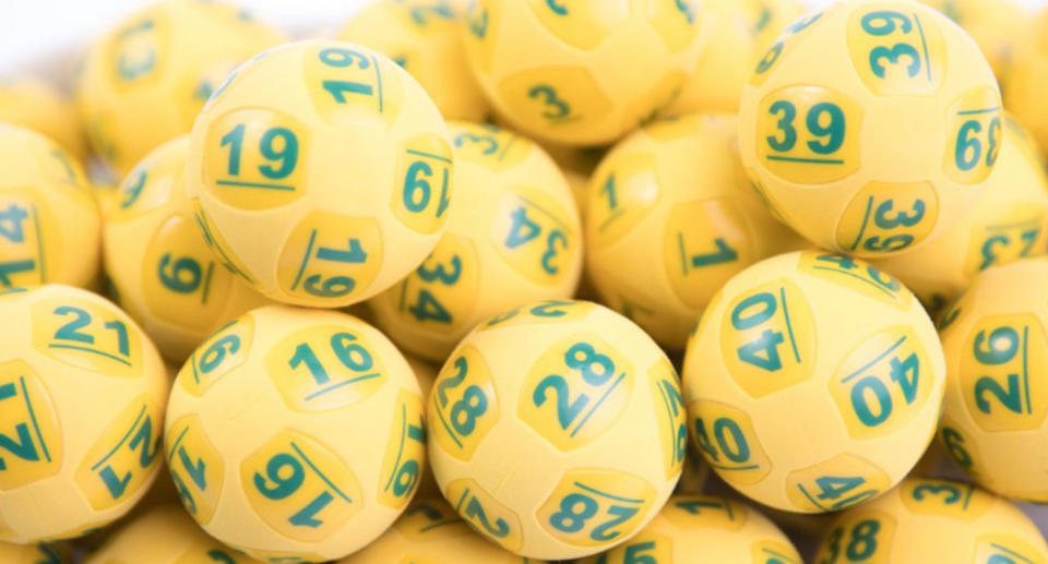 Oz Lotto playing balls pictured as officials call on the NSW $50 million jackpot winner to come forward.