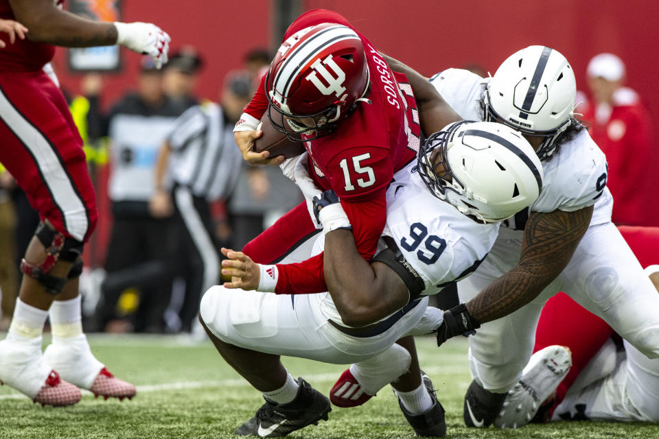 FILE - Indiana quarterback Brendan Sorsby (15) is sacked by Penn State defensive tackle Coziah Izzard (99) during an NCAA college football game Nov. 5, 2022, in Bloomington, Ind. Indiana opens their season at home against Ohio State on Sept. 2. (AP Photo/Doug McSchooler, File)