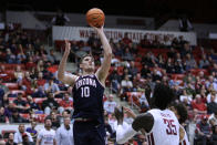 Arizona forward Azuolas Tubelis shoots while defended by Washington State forwards Mouhamed Gueye (35) during the second half of an NCAA college basketball game, Thursday, Jan. 26, 2023, in Pullman, Wash. Arizona won 63-58. (AP Photo/Young Kwak)