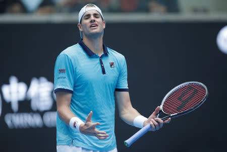 Tennis - China Open - Men's Singles Quarterfinals - Beijing, China - October 6, 2017 - John Isner of the U.S. reacts after losing a point against Rafael Nadal of Spain. REUTERS/Jason Lee