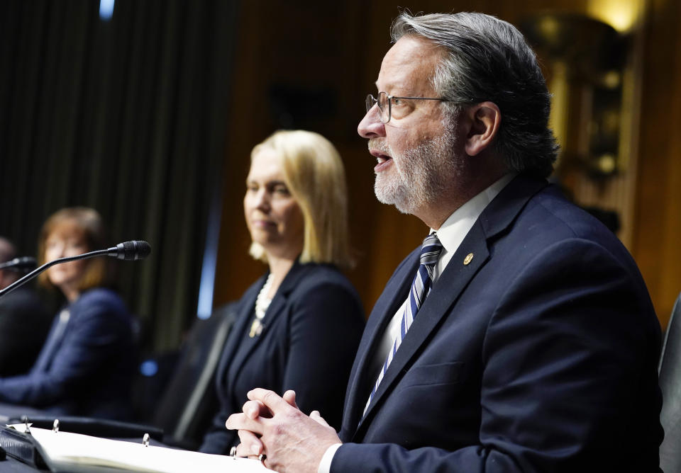 Sen. Gary Peters, D-Mich., introduces Bridget Brink, second from right, during her confirmation hearing before the Senate Foreign Relations Committee to become the U.S. Ambassador to Ukraine, Tuesday, May 10, 2022, on Capitol Hill in Washington. (AP Photo/Mariam Zuhaib).