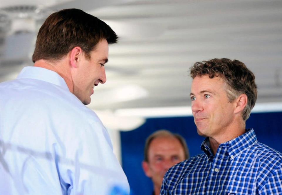The U.S. Senate candidates greeted each other on stage at the 130th Fancy Farm Picnic in Graves County on Saturday before launching into speaches criticizing each other. Democrat Jack Conway is at left; Republican Rand Paul at right.