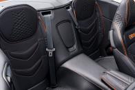 <p>Although it technically is a 2+2, the DBS's minuscule rear seats work better as glorified package shelves. </p>