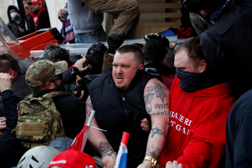 Pro-Trump protesters storm into the U.S. Capitol during clashes with police, during a rally to contest the certification of the 2020 U.S. presidential election results by the U.S. Congress, in Washington, U.S, January 6, 2021. REUTERS/Shannon Stapleton