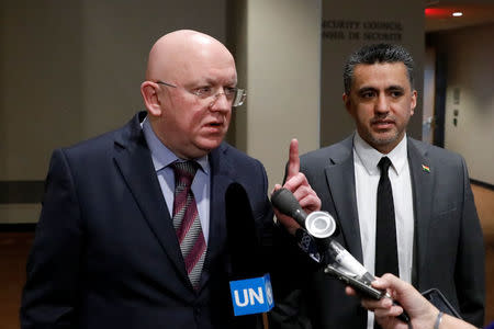 Russian Ambassador to the United Nations Vassily Nebenzia (L) and Bolivia's Ambassador to the United Nations Sacha Sergio Llorenty Soliz speak to the media outside Security Council chambers at the U.N. headquarters in New York, U.S., April 12, 2018. REUTERS/Shannon Stapleton