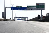 The highway leading to Paris and its main airport is empty as farmers block the highway, Monday, Jan. 29, 2024 near Chamant, north of Paris. Protesting farmers vowed to encircle Paris with tractor barricades and drive-slows on Monday, aiming to lay siege to France's seat of power in a battle with the government over the future of their industry, which has been shaken by repercussions of the Ukraine war. (AP Photo/Matthieu Mirville)