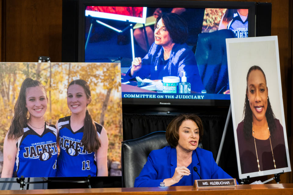 Amy Klobuchar, center