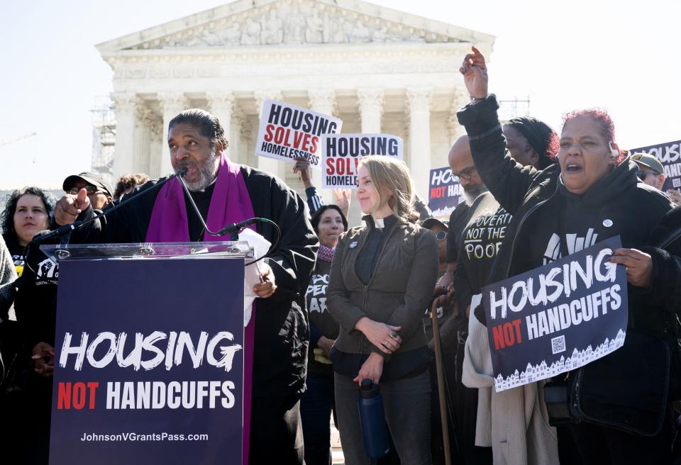 The Rev. William Barber speaks in support of people without housing alongside protesters on April 22, 2024, outside the Supreme Court as justices heard oral arguments in City of Grants Pass, Oregon v. Johnson.