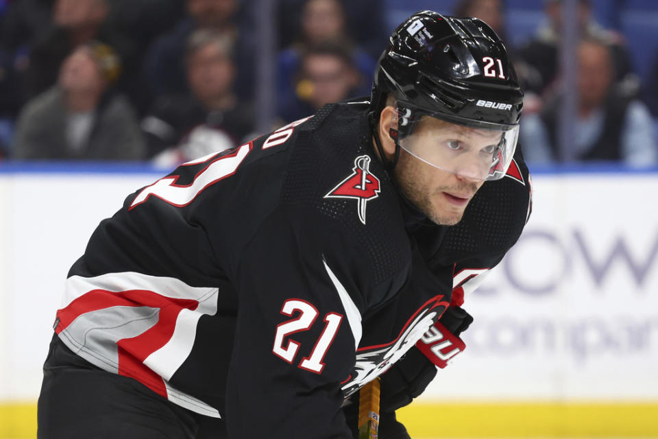 Buffalo Sabres right wing Kyle Okposo (21) lines up for a faceoff during the first period of an NHL hockey game against the Dallas Stars Tuesday, Feb. 6, 2024, in Buffalo, N.Y. (AP Photo/Jeffrey T. Barnes)