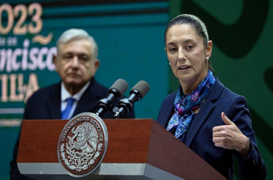 Claudia Sheinbaum, the mayor of Mexico City, speaks during a press conference in the capital on Jan. 20, 2023, as president Andres Manuel Lopez Obrador looks on. 