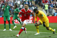 <p>Russia’s Denis Cheryshev celebrates after scoring his side’s second goal during the group A match between Russia and Saudi Arabia which opens the 2018 soccer World Cup at the Luzhniki stadium in Moscow, Russia, Thursday, June 14, 2018. (AP Photo/Matthias Schrader) </p>