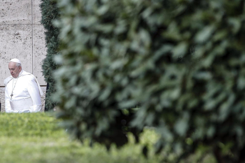 Pope Francis prays during the opening of the second day of a Vatican's conference on dealing with sex abuse by priests, at the Vatican, Friday, Feb. 22, 2019. Pope Francis has issued 21 proposals to stem the clergy sex abuse around the world, calling for specific protocols to handle accusations against bishops and for lay experts to be involved in abuse investigations. (Giuseppe Lami/Pool Photo via AP)