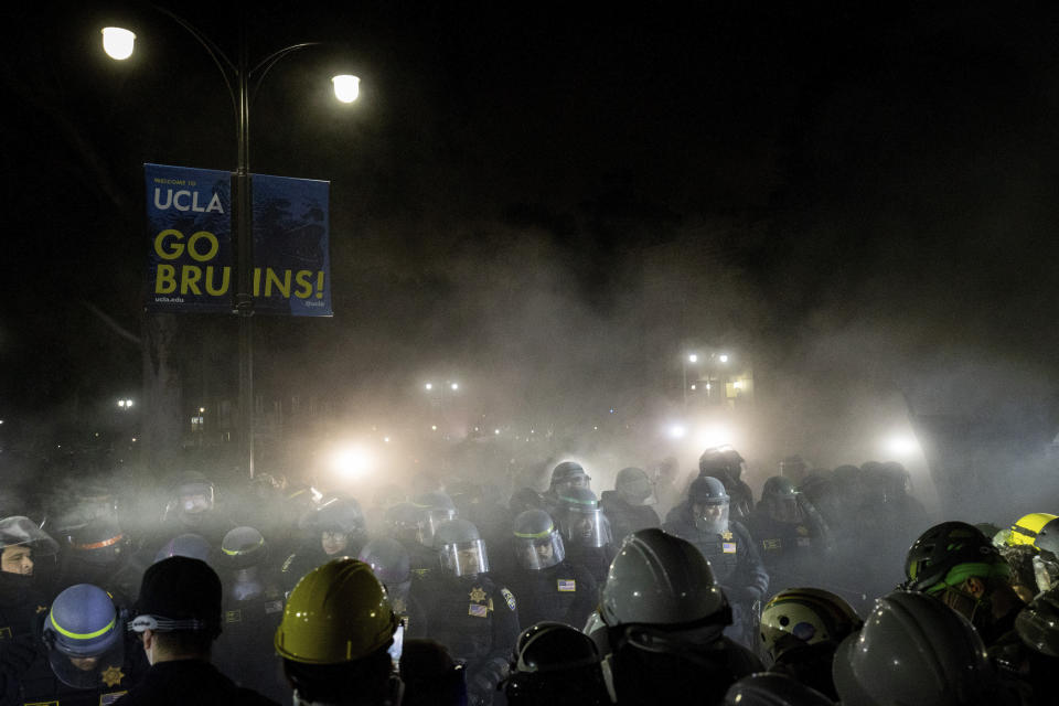 FILE - Police advance on pro-Palestinian demonstrators on the UCLA campus Thursday, May 2, 2024, in Los Angeles. (AP Photo/Ethan Swope, File)