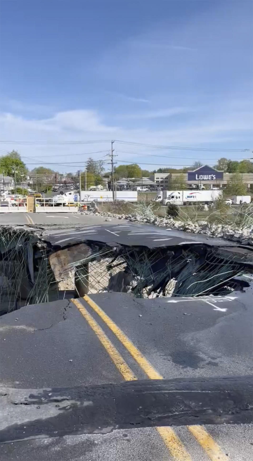 This photo provided by Norwalk, Conn. Police Dept., construction crews continue demolishing the Fairfield Avenue overpass early Saturday, May 4, 2024 in Norwalk, Conn. The bridge damaged in a fiery crash that kept Interstate 95 in Connecticut closed Thursday and Friday has been demolished. (Norwalk, Conn. Police Dept via AP)