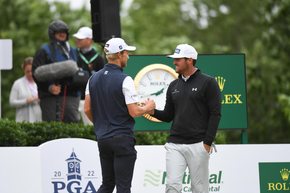 TULSA, OK - MAY 21: Will Zalatoris shakes hands with Mito Pereira of Chile on the first hole during the third round of the 2022 PGA Championship at the Southern Hills on May 21, 2022 in Tulsa, Oklahoma. (Photo by Montana Pritchard/PGA of America via Getty Images)
