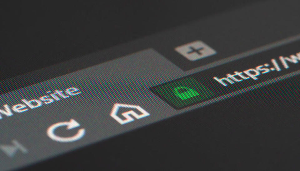 Close-up of a web browser's basic buttons and address bar in dark mode.