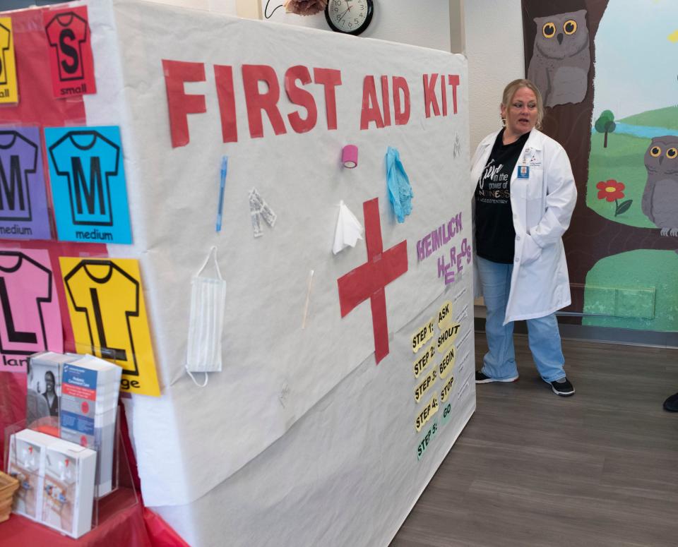 Melissa Byrd, a pediatric nurse practitioner, prepares for her next patient at the Community Health Northwest Florida Clinic at C.A. Weis Elementary School on Friday. Escambia County Public Schools and Community Health Northwest Florida are joining force to replicate a similar clinic at Pine Forest High School.