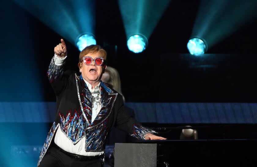 Los Angeles, California November 17, 2022-Elton John performs during his farewell tour at Dodger Stadium in Los Angeles Thursday. (Wally Skalij/Los Angeles Times)