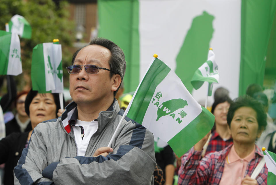 Protesters with "Taiwan independence flags" attend a rally in Taipei, Taiwan, Saturday, Oct. 20, 2018. Thousands of pro-independence demonstrators gathered in Taiwan’s capital on Saturday to express their disapproval with China’s stance toward their island. (AP Photo/Chiang Ying-ying)