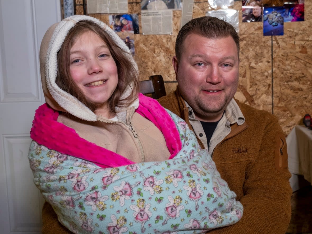 Lily and Jon Ganshorn, her dad, formed the Dinosaur Hunter Gang about four years ago.  (Kendall Latimer/CBC - image credit)