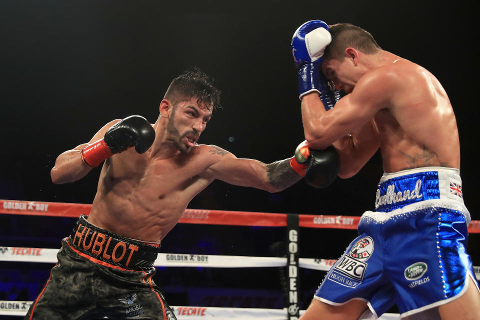 Jorge Linares, left, exchanges punches with Luke Campbell during Linares’ lightweight title defense in September 2017 in Inglewood, California. (Getty)