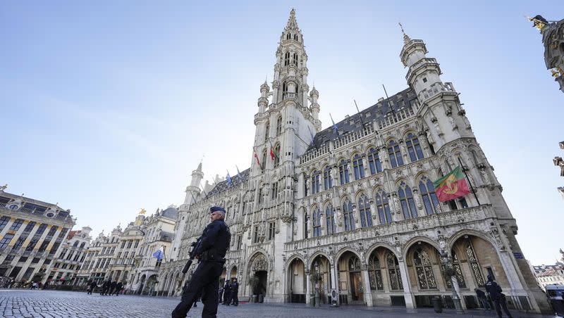 Belgian Police patrol the Grand Place in central Brussels, Tuesday, Oct. 17, 2023, following the shooting of two Swedish soccer fans were shot by a suspected Tunisian extremist on Monday night. Police say they have shot and killed the suspect.