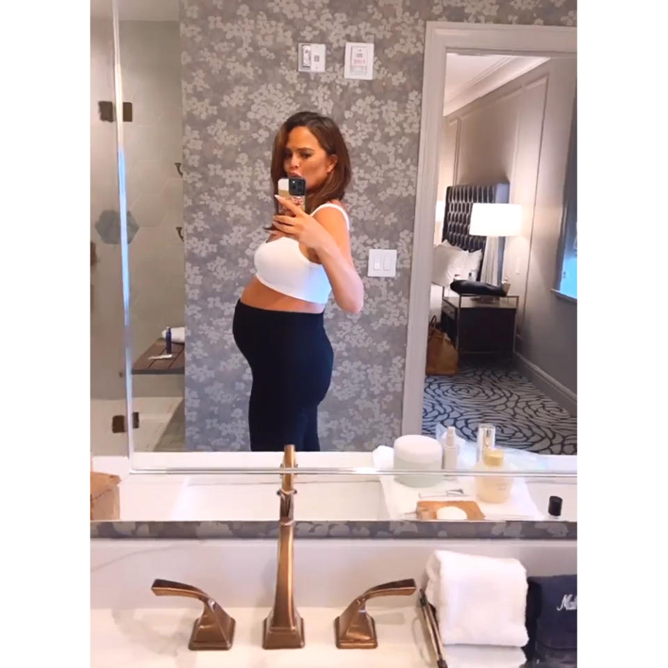 Teigen showed off her growing bump in an Instagram Story mirror selfie.