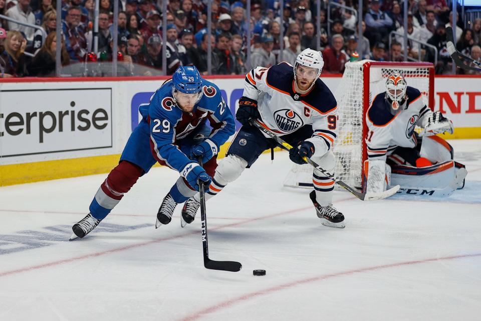 Colorado Avalanche center Nathan MacKinnon, left, and Edmonton Oilers center Connor McDavid will be two of the four captains at this weekend's NHL All-Star Game in Toronto.
