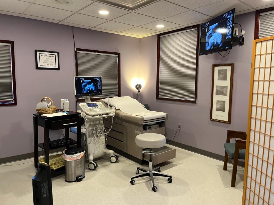 A patient room and an ultrasound machine at Women's Choice Center, an anti-abortion pregnancy resource center in Bettendorf.