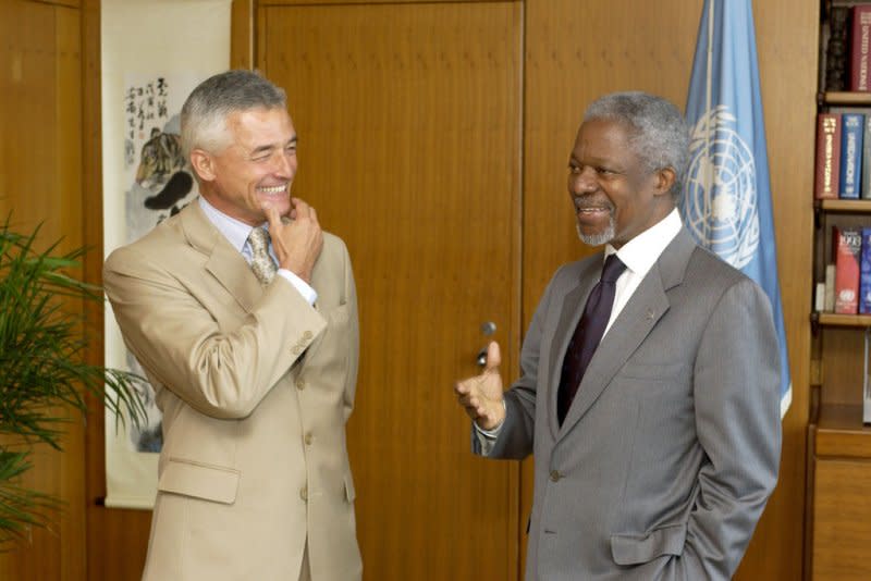 United Nations Secretary General Kofi Annan (R) chats on July 29, 2002, with Sergio Vieira de Mello from Brazil, the new United Nations High Commissioner for Human Rights. On August 19, 2003, de Mello was killed in a car-bomb attack on U.N. headquarters in Iraq. File Photo by E. Debebe/UPI