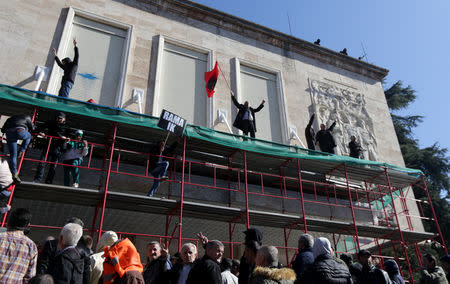 Supporters of the opposition party try to break into a government building that houses the office of Prime Minister Edi Rama during an anti-government protest in Tirana, Albania, February 16, 2019. REUTERS/Florion Goga