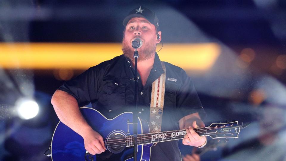 Luke Combs performs the half-time show of the NFL game