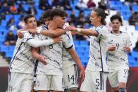 Italy's Cesare Casadei, second from left, celebrates with teammates after scoring a goal during a FIFA U-20 World Cup Group D soccer match against the Dominican Republic, at the Malvinas Argentinas stadium in Mendoza, Argentina, Saturday, May 27, 2023. (AP Photo/Natacha Pisarenko)