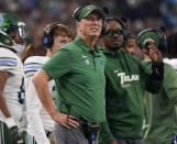 FILE - Tulane head coach Willie Fritz , center, looks on from the sideline during the second half of the Cotton Bowl NCAA college football game against Southern California, Jan. 2, 2023, in Arlington, Texas. At No. 24, Tulane enters this season as the only team from a mid-major conference in the AP Top 25. Fritz does not want to dismiss the hype entirely. It amounts to newfound respect for a team pegged to finish last in the AAC's 2022 preseason poll. (AP Photo/Sam Hodde, File)