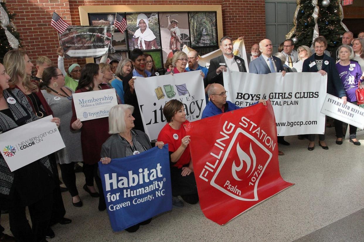 Representatives gather for a photo during the 2018 Giving Tuesday event at the North Carolina History Center in New Bern.